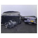 Sony Handy-Cam with charger and carrying case, working condition unknown, see pictures for details.