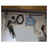 ALL ITEMS HANGING ON PEGBOARD MARKED 9124 INCLUDING TILE CUTTER, FUNNEL, SQUEEGEE, SMALL SECTION OF CHAIN, AND MORE