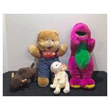 Assorted plush toys to include Beanie Babies, Shoneys bear, and Barney. Four pieces total, see pictures for details.