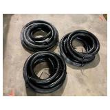 Flexible hose, approximately 1 3/4” O. D., and approximately 30’ total. See pictures for details.