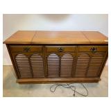 Vintage Sears Silvertone radio/stereo console, powers up, radio works, turntable works but turns slow, may need a new belt, see pictures for details.