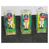 Atlanta Braves mini bobble heads, Tom Glavine, Chipper Jones, and Grey Maddux, see pictures for details.