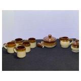 Assortment of two toned stoneware cups, sugar and creamer, and soup bowl. Soup bowl handle is broken but included, approximately eight pieces, see pictures for details.