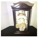 Camellia Garden Collection porcelain doll in a wooden display case. See pictures for details.