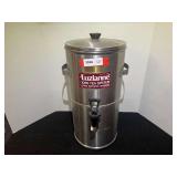 Metal tea dispenser with lid, see pictures for details.