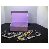 Decorative storage box of assorted fashion jewelry, see pictures for details.