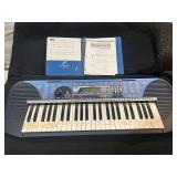 Yamaha keyboard with instruction booklet, also comes with storage/carrying case, working condition unknown, no cord but can be battery powered, see pictures for details.