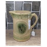 ANTIQUE A. E. HULL POTTERY YELLOWWARE GRAZING COW PATTERN PITCHER