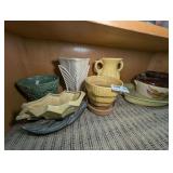 POTTERY ON FLOOR BENEATH CABINET, MOSTLY MCCOY