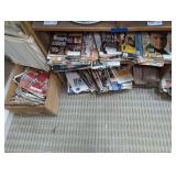 VINTAGE NEWSPAPERS, ENTERTAINMENT MAGAZINES, ROLLING STONE MAGAZINES, AND MID-CENTURY LIFE MAGAZINES ON BOTTOM TWO SHELVES AND BESIDE