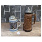 PAIR OF VINTAGE GERMAN STEINS