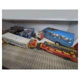 ALL MODELS ON BOTTOM SHELF AND ON FLOOR DIRECTLY IN FRONT LABELED 1275 INCLUDING TONKA