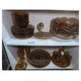 AMBER DEPRESSION GLASS STYLE DISHES AND SERVING PIECES ON BOTTOM TWO SHELVES MARKED 1505