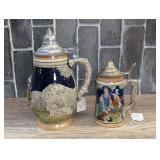 PAIR OF VINTAGE GERMAN STEINS