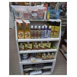 COMPACT WHITE DISPLAY CABINET AND CONTENTS INCLUDING VINTAGE PLAYING CARDS, VINTAGE AND ANTIQUE POSTCARDS, CLEANING SUPPLIES, COIN BOOKS, AND MORE