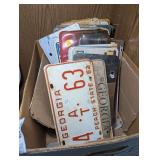 BOX FILLED WITH VINTAGE LICENSE PLATES FROM MULTIPLE STATES