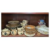 CONTENTS OF SHELF MARKED 1319 INCLUDING MID-CENTURY PENNSBURY POTTERY STONEWARE CHINA, NAPKIN RINGS, SIGNED MID-CENTURY HAND-PAINTED COVERED VEGETABLE, ROCK AND ROLL JUKEBOX, AND MORE