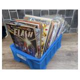 SMALL TUB FILLED WITH COMIC BOOKS