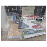 MID-CENTURY AUTOMOBILE OWNERS MANUALS, ADVERTISING, AND PAIR OF DIECAST MODEL CARS