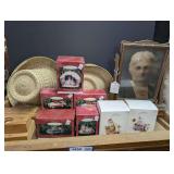 HALLMARK KEEPSAKE ORNAMENTS, STRAW HATS, AND ANTIQUE TILT FRAME WITH PORTRAIT ON TOP OF BROWN CABINET MARKED 1450