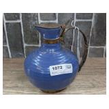OLD GLAZED POTTERY PITCHER WITH METAL FRAME