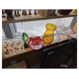 VINTAGE DECORATIVE GLASS IN SHELF SECTION MARKED 1157