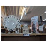 MASON JARS, LACE EDGE MILK GLASS DECORATIVE PLATE, GAME COWBELL, AND MORE ON TOP OF CABINET MARKED 1662