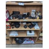ALL VINTAGE CAMERA EQUIPMENT, OLD BOSTON PENCIL SHARPENER IN ORIGINAL BOX, AND MORE ON FOUR BOTTOM SHELVES MARKED 1472