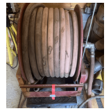 Fire hose reel with hose, furniture dolly is not included, see pictures for details.