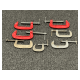 Small C clamps, approximately seven pieces, tub is not included, see pictures or details.