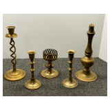 Assortment of brass candlestick holders and home decor, approximately seven pieces, see pictures for details.