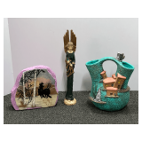 Native American decor to include a wedding vase, the howling coyote at the top is missing the head. Also includes a ceramic faux rock, Native American themed, and more. See pictures for details.