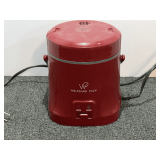 Wolfgang Puck 1.5-Cup Multi Pot Mini Cooker, powers up, working condition unknown, see picture or details.