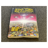 “The Star Trek Encyclopedia, A Reference Guide to the Future”, see pictures for details.