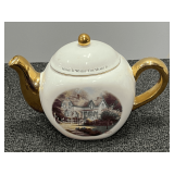 Thomas Kinkade Telefloral teapot with gold trim, see pictures for details.