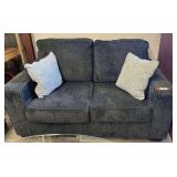 Pillow back loveseat from Ashley furniture, comes with two accent pillows, see pictures for details.