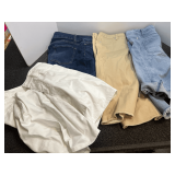 Vintage hat box filled with assorted jean shorts, please inspect for size and fashion, see pictures for details.