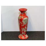 Tall candlestick holder with floral motif, see pictures for details.