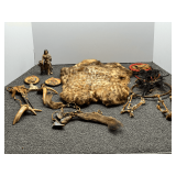 Assorted Native American decor to include dreamcatchers, animal skin, antler art, ceramic figurine, and more. See pictures for details.