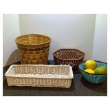 Woven baskets and faux fruit, see pictures for details.