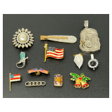 Assorted Jewelry Including Pendants, Brooches, and Hair Clip