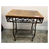 Vintage-style side table with wooden top and a wrought iron magazine rack. See pictures for details.