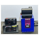 Vintage Vivitar PS 44 camera, also includes a vintage Polaroid Sun 600 LMS camera, both come with original boxes, working condition unknown of these items, see pictures for details.
