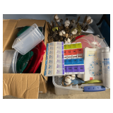 Mystery lot of assorted household items and decor, includes cake carrier, stove plate covers, assorted storage containers, greeting cards, and much more. See pictures for details.