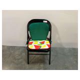 Metal folding chair with padded cushions, see pictures for details.