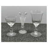 Lovely stemware, believed to be vintage Heisey glass, also includes a beautiful bud vase, believed to be an antique Bryce Brothers  trumpet vase, three pieces total, see pictures for details.