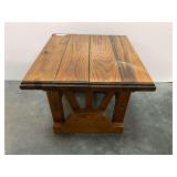Rustic wooden end table with sunburst leg design, see pictures for details.
