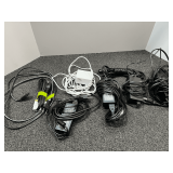 Assorted chords/charging cords, tub is not included, see pictures for details.