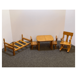 Strombecker wooden doll furniture, includes table and chairs, rocking chair, and bedframe. See pictures for details.