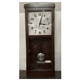 Vintage Western Union self-winding clock, with a wooden regulator-style case with a glass front panel. Working condition unknown, see pictures for details.